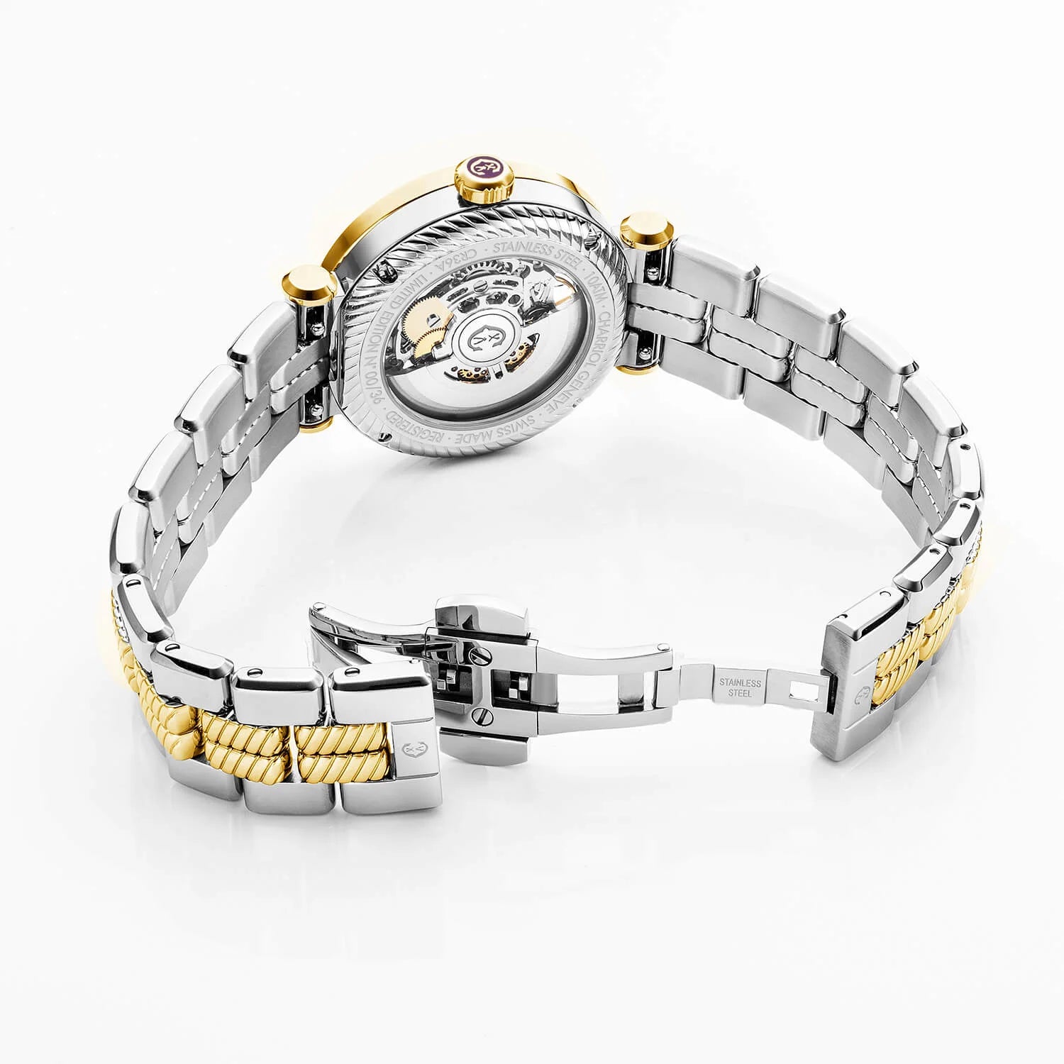 NAVIGATOR CRUISE36MM, CHARRIOL SKELETON CALIBRE AUTOMATIQUE, CRISTAL AVEC CADRAN INDEX DE 12 DIAMANTS, PVD OR JAUNE ACIER AVEC 30 DIAMANTS FULLCUTS & 6 DIAMANTS BEZEL, BRACELET INTERCHANGEABLE BICOLORE METALLIQUE - © 2024 Charriol - Montres