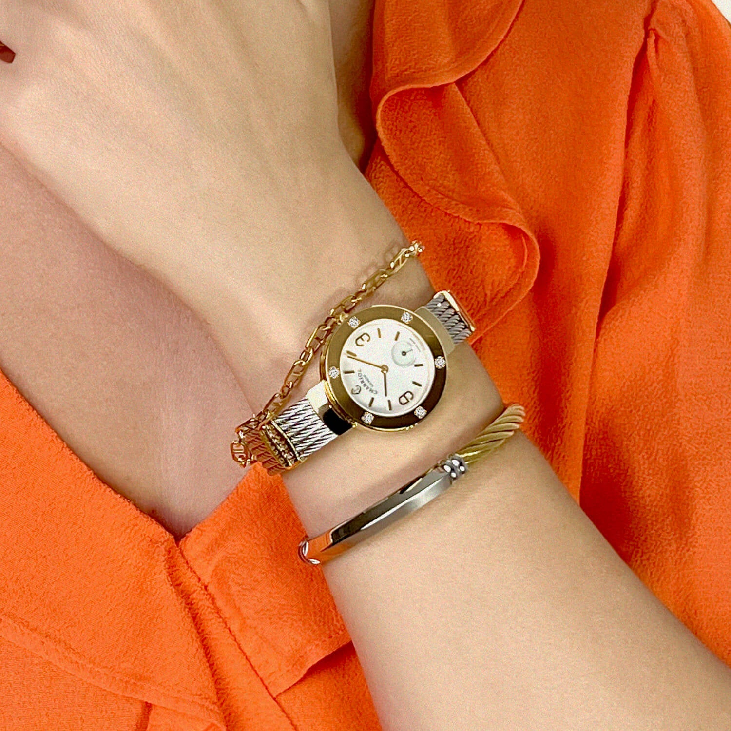 ST TROPEZ30MM, CALIBRE QUARTZ, CADRAN NACRE, PVD OR JAUNE AVEC 6 DIAMANTS, BRACELET CABLE ACIER - Charriol Geneve - Montres